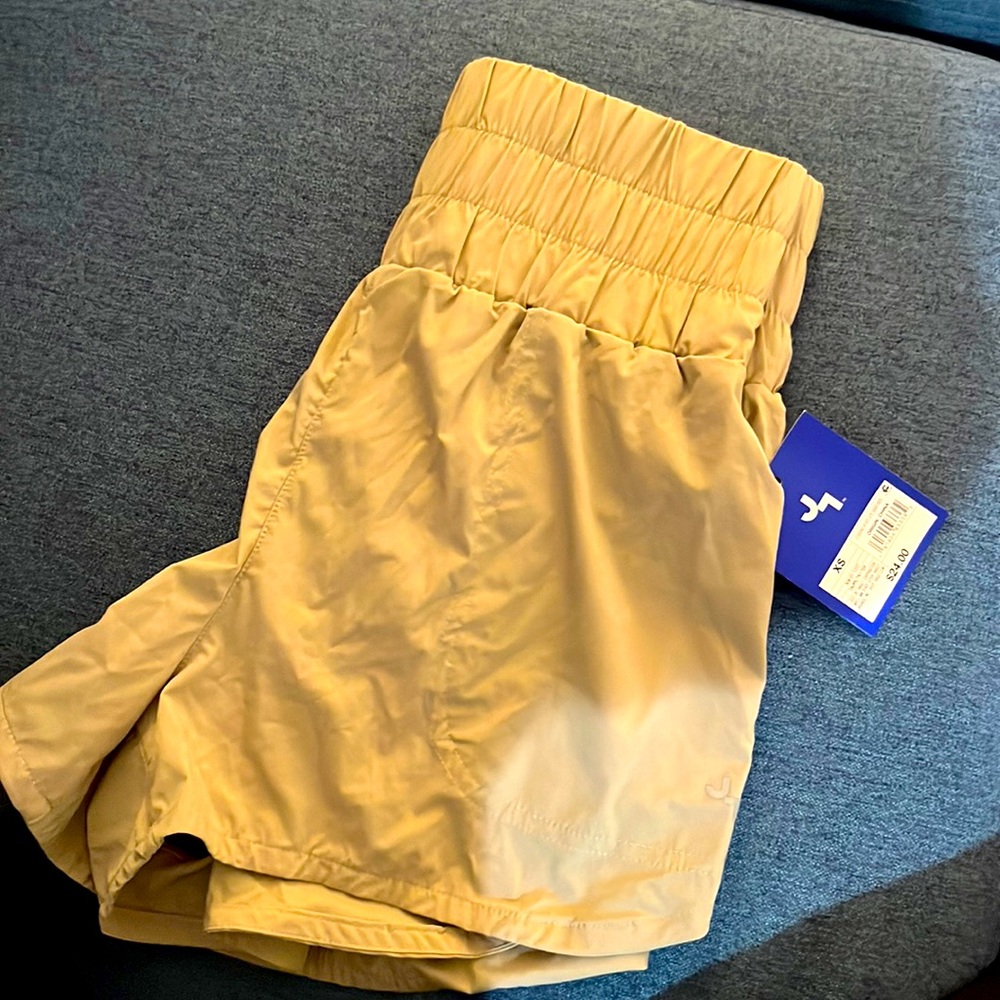 Joy lab High waisted running shorts with tags, never worn in tan,